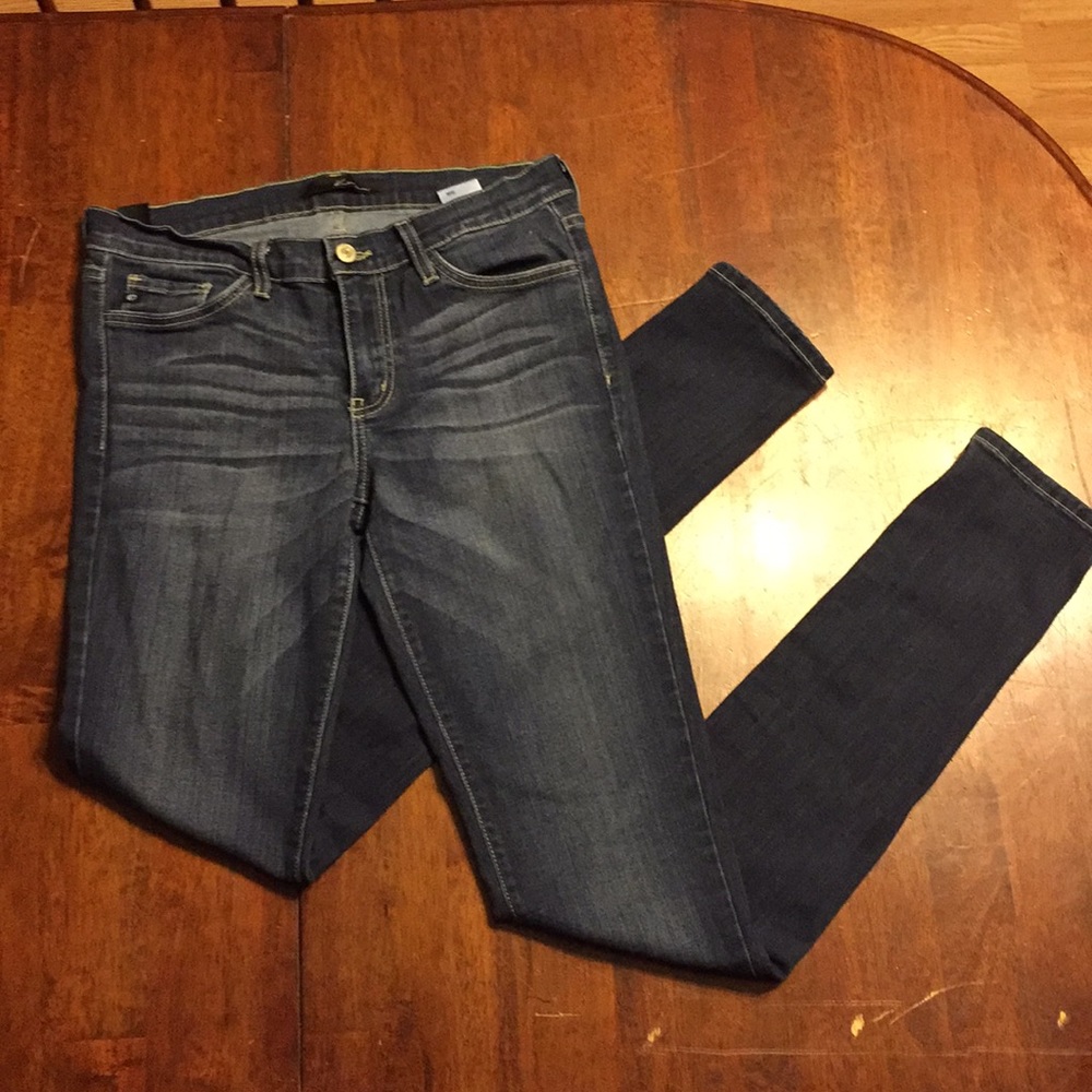 Dark wash stretch skinny jeans.